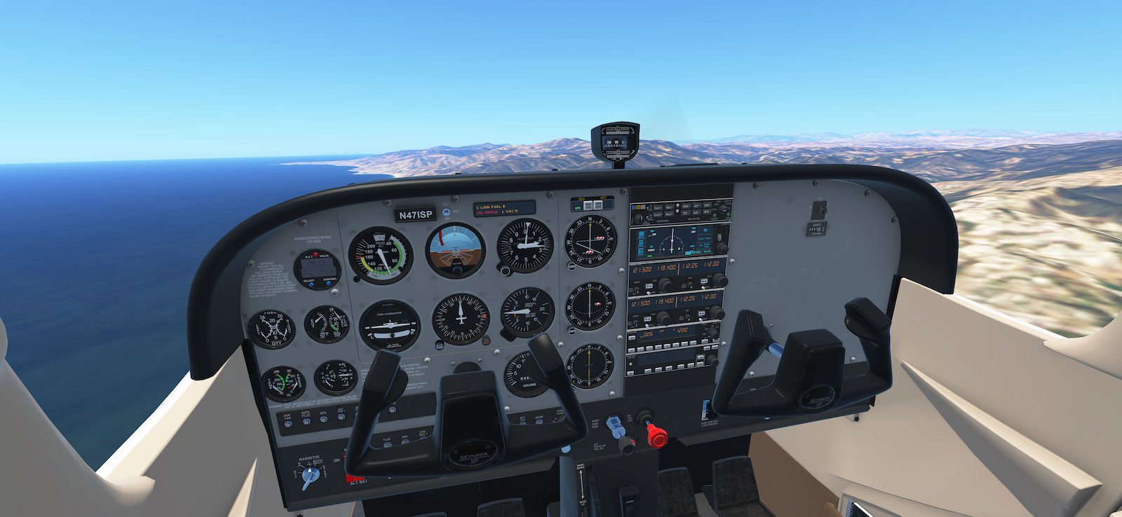 Screenshot of a Cessna 172 cockpit in Infinite Flight with the Pacific Ocean and mountains out the windows.